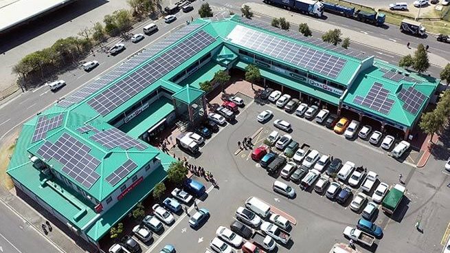 An aerial photograph of solar PV panels on the roof of Viking Business Park.